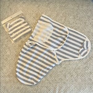 Unbranded swaddle with matching hat